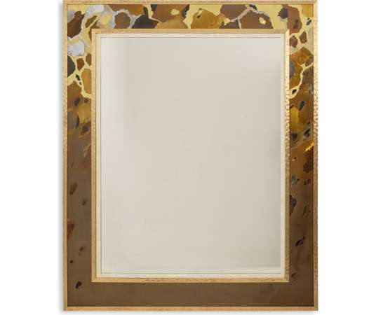Miroir en marqueterie de laiton oxydé et patiné. Travail d’artiste