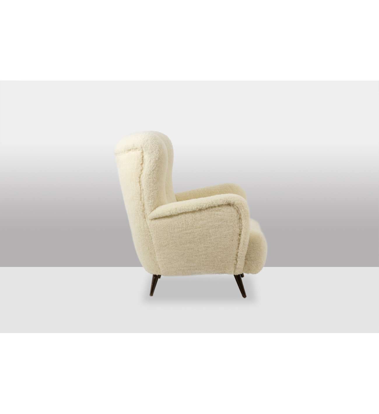 Armchair, or bergère, with its... Armchair, or bergère, with its bouclette fabric. 1950s